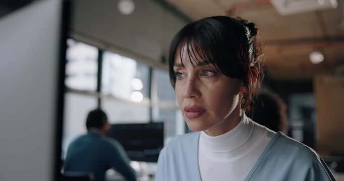 Reading, computer and business woman in office for online review, proofreading article and research. Creative, agency or mature person on pc for editing report, website portfolio or story publication