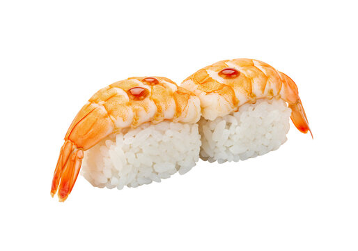 Shrimp sushi close up of two pieces of cooked shrimp on rice with red sauce