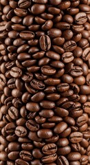 Obraz premium Close-up macro shot of roasted coffee beans, showcasing their rich texture and deep brown color, perfect for beverage or food-related projects