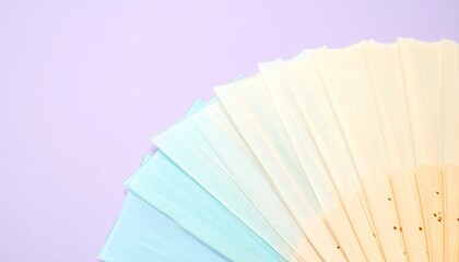 Pastel Gradient Paper Fan on Purple Background
