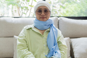 Portrait of the patient's smile is a cancer adult Asian woman, where the strong mind