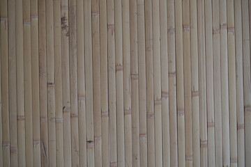 Bamboo wood panel texture, vertical bamboo slats, natural brown wooden background