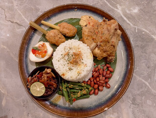 Delicious Indonesian Nasi Campur with Grilled Chicken