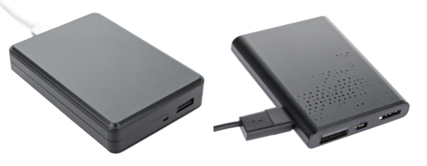 Two External Hard Drives Positioned Side by Side with USB Connection Cables Against White Background Illustrating Modern Data Storage and Transfer