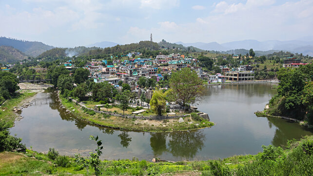 Scenic view of Gomati River, featuring the Baijnath Group of Temples and town, nestled in Bageshwar, Uttarakhand, India.