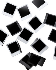 Floating instant photo frames in grayscale, scattered