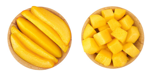 mango diced in wooden bowl isolated on white background. Top view. Flat lay