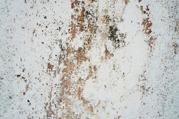 Grungy cement texture background. Spots of white paint on a gray concrete background, texture,...