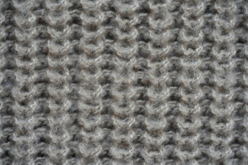 texture of knitted light brown sweater, close-up texture of beige knitted fabric, macro texture of tan knitted woolen clothes	
