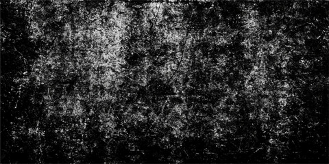 Vintage textured black asphalt pattern with white grunge spots, perfect for a seamless wallpaper design