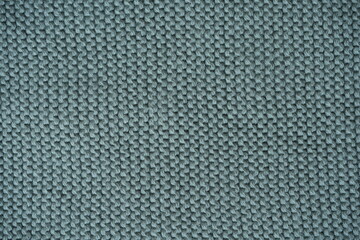  marsh texture of knitted fabric, macro texture of green wool fabric, geometric knitted pattern of crocheted elastic as a background
