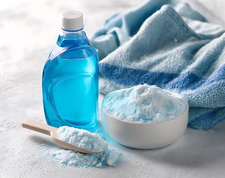 Blue liquid detergent and powdered laundry booster with towels