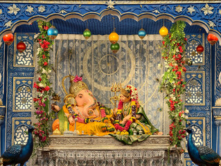 27 August 2025, Most famous Ganpati in Pune, Idol of Ganesha with Sharada in sitting pose in pandal, Pune, Maharashtra, India, Asia
