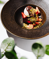Delicious dessert featuring strawberries and chocolate in elegant setting