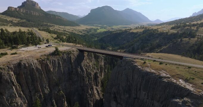 Scenic aerial view of Sunlight Bridge on Beartooth Hwy, Montana, mountains abound