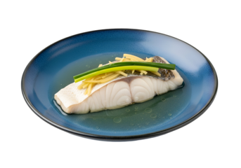 Steamed fish fillet, garnished with ginger and scallions, presented on a vibrant blue plate.