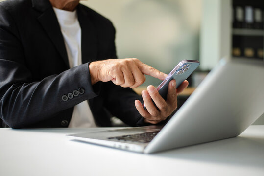 Businessman s hands typing on laptop keyboard in morning light computer, typing, online - Powered by Adobe