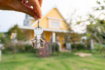 lease, rental and selling home. Real estate agent hold key for new house or real estate. rent...