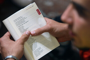 Pilgrim holding a prayer book.   Madrid. Spain.