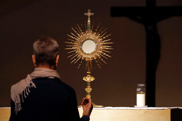 The Blessed Sacrament in a monstrance. Eucharist adoration. Paray le Monial. France.