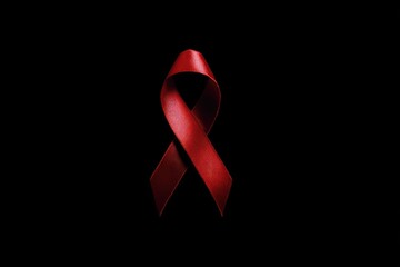 Dark red ribbon on black background