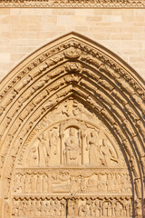 Paris Notre Dame cathedral west wing : Saint Anne's gate.  Paris. France.