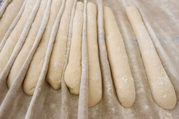 Bread making.   French baguette. Paris. France.