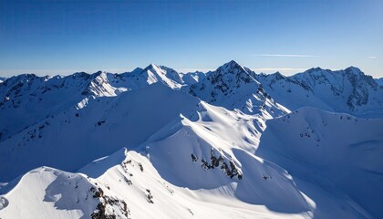Obraz premium Aerial View of Snow Covered Mountain Ridges