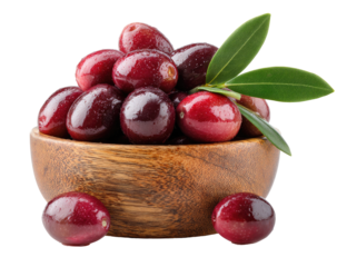 Fresh dark red olives in a wooden bowl with leaves