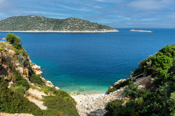 Magnificent natural bays and small beaches on the highway between Finike and Demre (Kale, Myra) settlements in the Mediterranean

