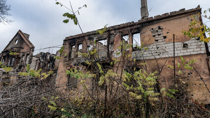 ruined street and destroyed houses the city Kiev war in Ukraine