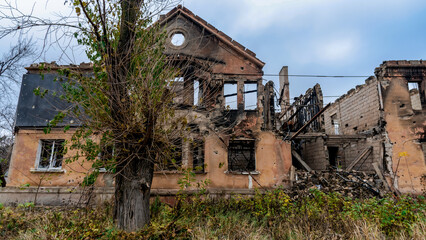 ruined street and destroyed houses the city Kiev war in Ukraine
