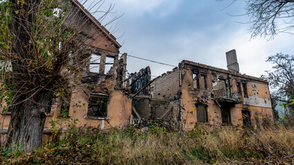 ruined street and destroyed houses the city Kiev war in Ukraine