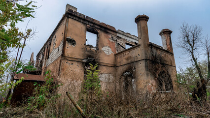 ruined street and destroyed houses the city Kiev war in Ukraine