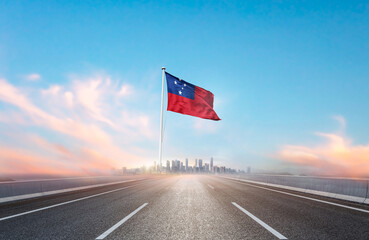 Samoa national flag with mast waving with beautiful skyline. A view from highway. Samoa flag for Republic Day and Independence Day.