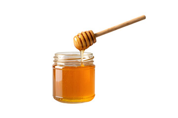 Wooden honey dipper dripping golden honey into clear glass jar filled with amber colored sweetener, isolated on a transparent background