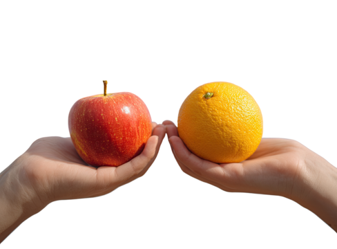 Two hands hold an apple and orange