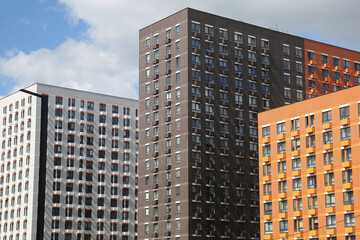 Naklejka premium Facades of houses in the new microdistrict called Buninskie Lugy (