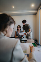 Young couple consulting with a professional financial adviser in a modern bank setting, discussing topics like loans and financial advising, highlighting teamwork and professional guidance.