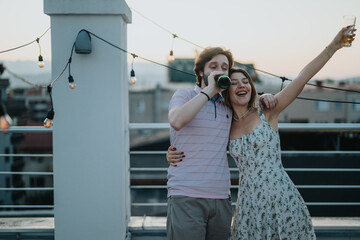 Rooftop celebration featuring two friends enjoying drinks, sharing laughter and creating memories....