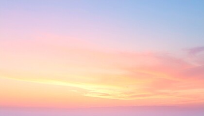 A serene sunset sky with soft pastel hues of pink, orange, and yellow blending smoothly into each other, casting a warm, peaceful glow over the horizon and evoking calmness and natural beauty.