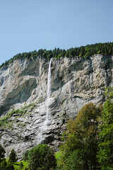 Scenic Alpine Waterfall in Lauterbrunnen, Switzerland