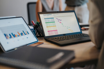 A bank setting where a young couple discusses financial solutions with an adviser. Electronic...