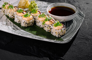 Exquisite sushi roll with shrimp and soy sauce
