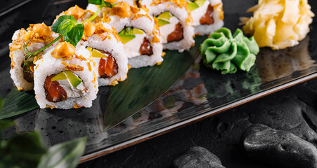 Gourmet sushi rolls with fresh toppings on elegant plate