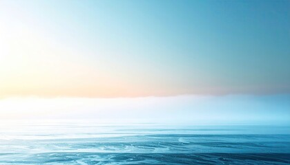 Obraz premium Tranquil Sunrise Over a Misty, Icy Plain