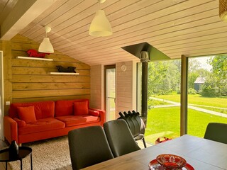 Modern and stylish interior of a country house on a summer day. High quality photo