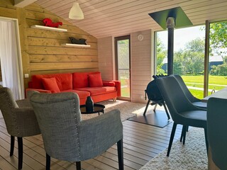 Modern and stylish interior of a country house on a summer day. High quality photo