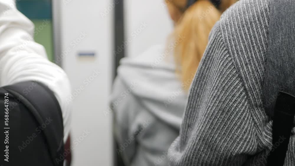 Canvas Prints selective focusing pov to rear back view of passenger while waiting to get out of the train subway c