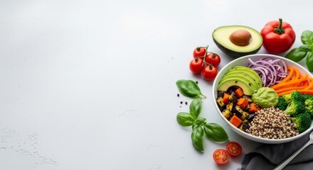 Healthy Vegan Buddha Bowl with Fresh Vegetables, Quinoa, and Avocado on a White Background